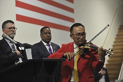Vice Chair of the CAGOP Peter Kuo attended the fundraiser in Morgan Hill and played God Bless America_400